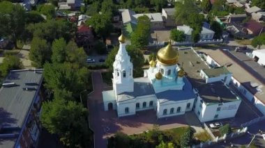 The dome of the Church and the cross top view over
