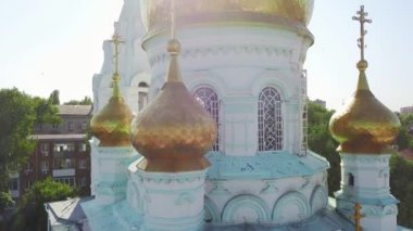 The dome of the Church and the cross top view over