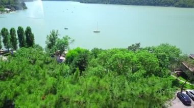 Park and lake with a pier in Abrau Dyurso top view