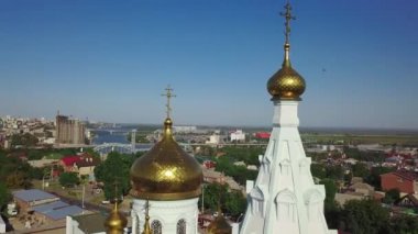 The dome of the Church and the cross top view over