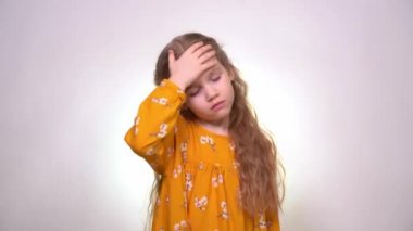 Headache of little girl crying, blond hair