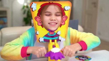 little girl plays pie in the face