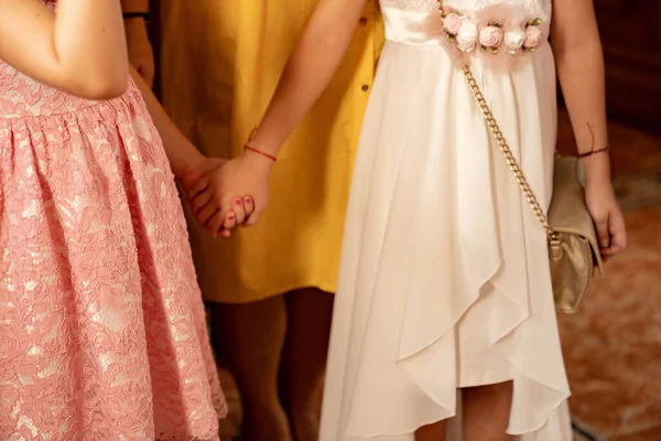 Guests wedding without faces hold hands in Church. — стокове фото