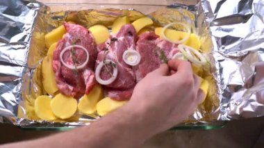 on raw potatoes and pork neck put sprigs of thyme.