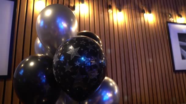 Silver and black balloons for the holiday — Αρχείο Βίντεο