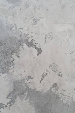 Sert alçılı gri duvar. pürüzlü yüzey.