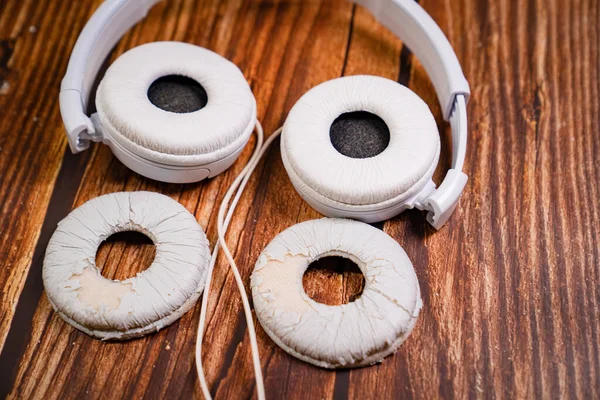 stock image need a replacement embouchures on old white earbud