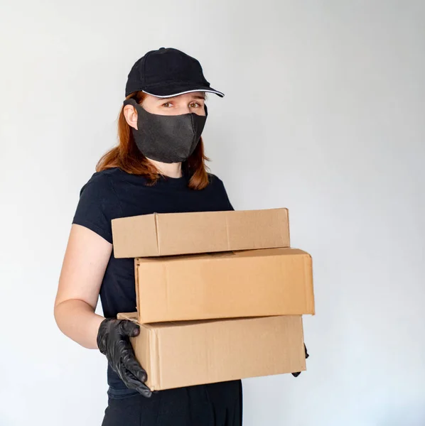 woman Delivery person holding boxes