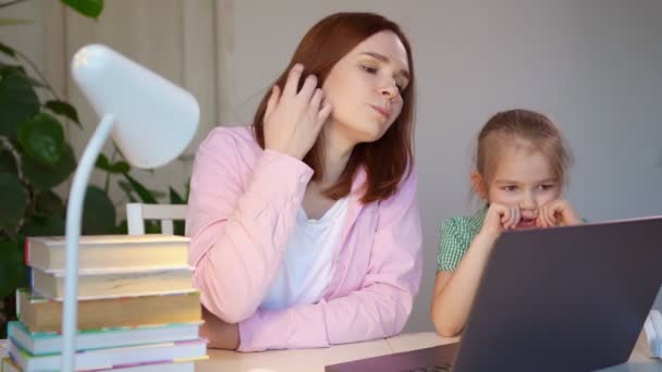 Mom and little daughter lessons, distance learning — Stock Video