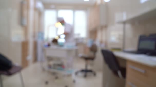 Bokeh borrão fundo na recepção do consultório odontológico — Vídeo de Stock