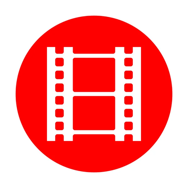 Carrete de señal de película. Icono blanco en círculo rojo . — Vector de stock