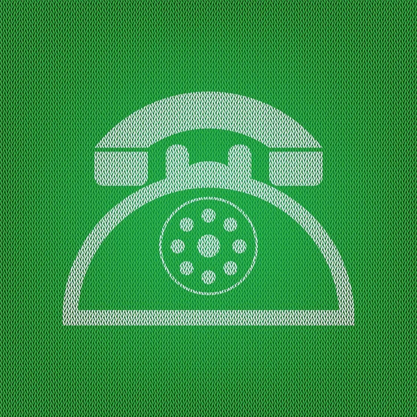 Retro telephone sign. white icon on the green knitwear or woolen — Stock Vector