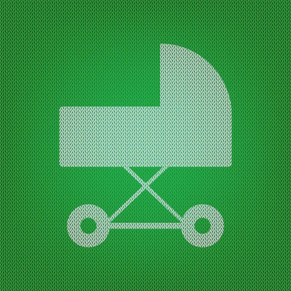 Иллюстрация коляски. белый значок на зеленом трикотаже или шерсти — стоковый вектор