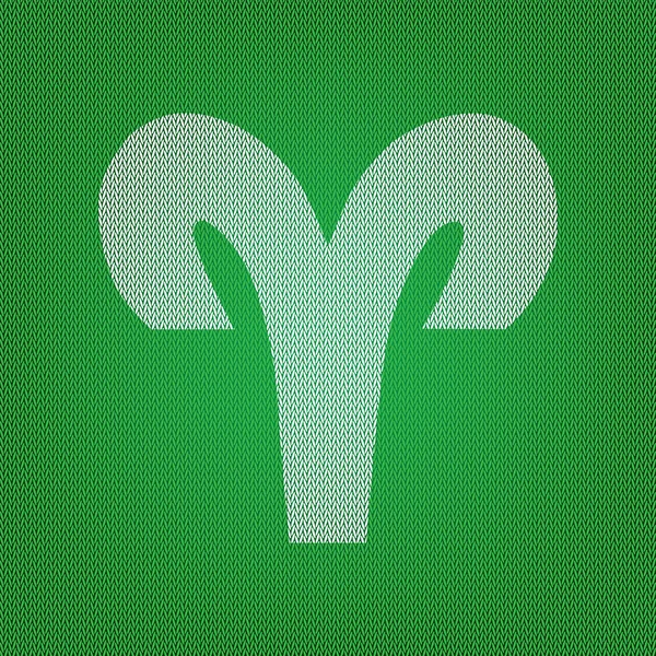 Ilustrasi tanda Aries. ikon putih pada knitwear hijau atau woo - Stok Vektor