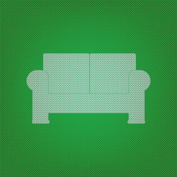 Sofaschild-Illustration. weißes Symbol auf der grünen Strickwaren oder Wolle — Stockvektor