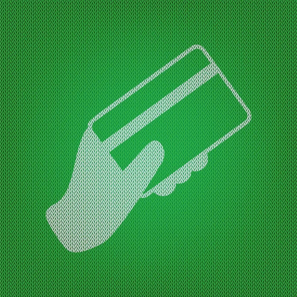 Bir kredi kartı tutan el. Yeşil Triko beyaz simgesini veya — Stok Vektör