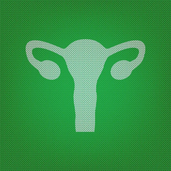 Human Body Anatomy Uterus sign. white icon on the green knitwear