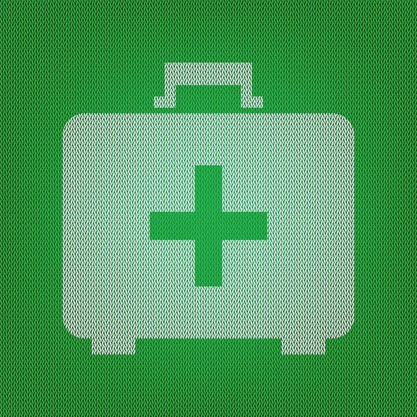 Medische EHBO doos teken. wit pictogram op de Groene gebreide of — Stockvector