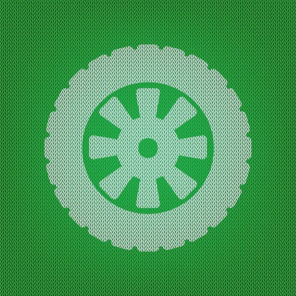 Señal de neumático. icono blanco en la prenda de punto verde o tela de lana — Vector de stock