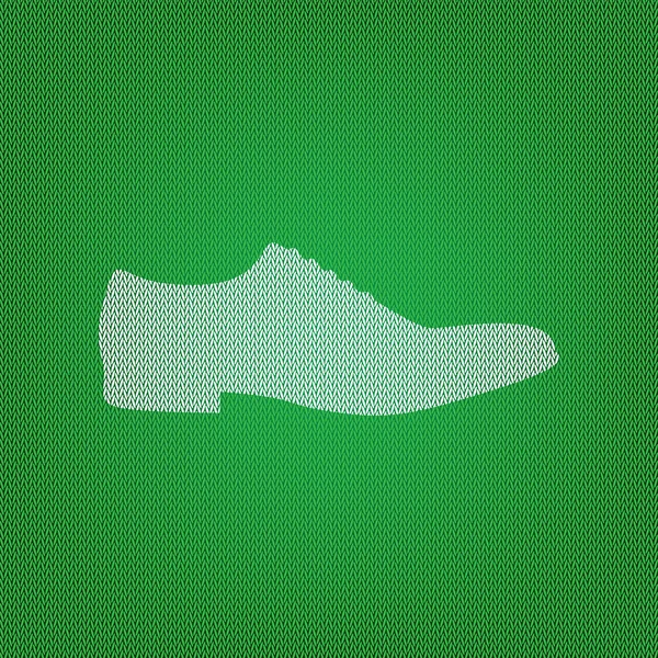Знак мужской обуви. белый значок на зеленом трикотаже или шерстяной ткани — стоковый вектор