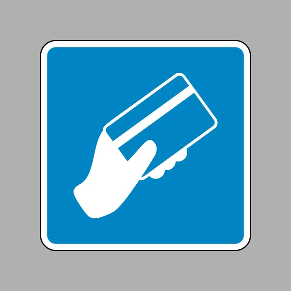 Hand hält eine Kreditkarte. weißes Symbol auf blauem Schild als Hintergrund — Stockvektor