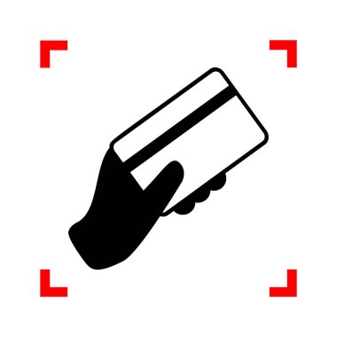 Bir kredi kartı tutan el. Odak köşe beyaz üzerine siyah simgesi