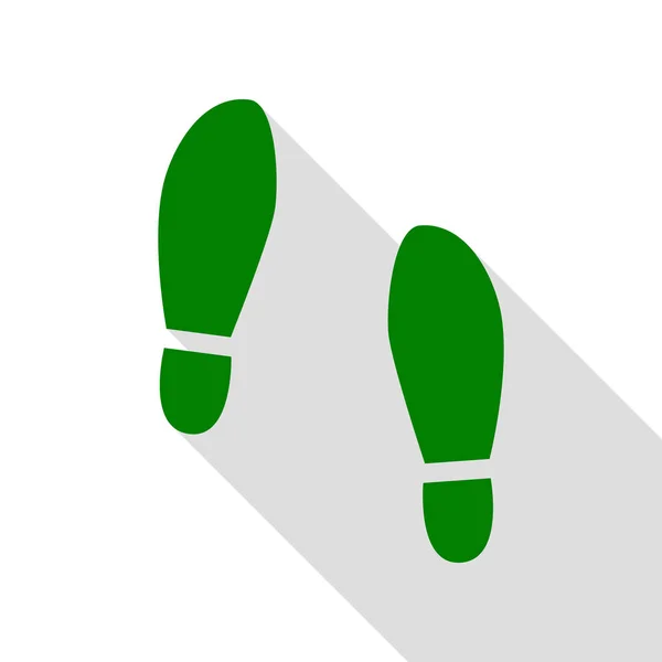Impronta suole scarpe segno. Icona verde con percorso ombra in stile piatto . — Vettoriale Stock