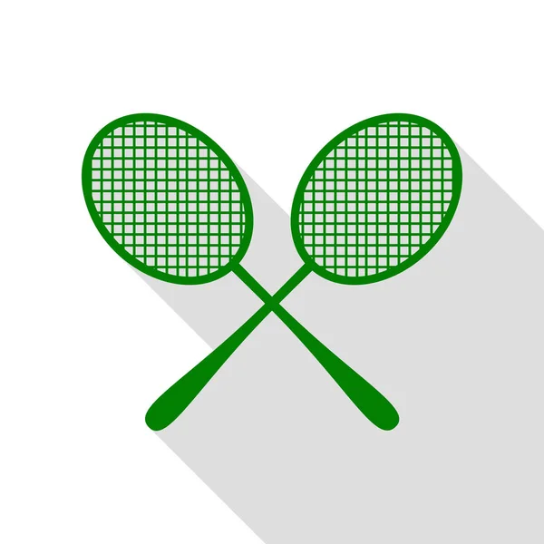 Firma de raquetas de tenis. Icono verde con camino de sombra de estilo plano . — Vector de stock