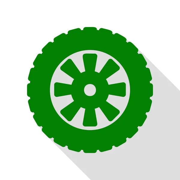 Señal de neumático. Icono verde con camino de sombra de estilo plano . — Vector de stock
