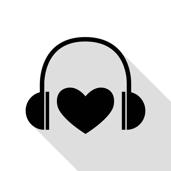 Headphones with heart. Black icon with flat style shadow path. — Stock Vector