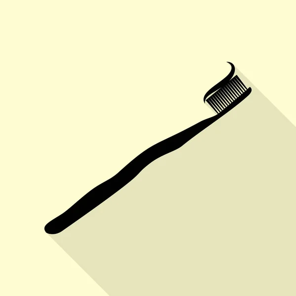Zubní kartáček s část aplikované pasty. Černá ikona s ploché styl stínu cestou na krém pozadí. — Stockový vektor