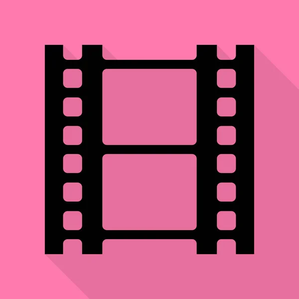 Reel van film teken. Zwarte pictogram met vlakke stijl schaduw pad op roze achtergrond. — Stockvector