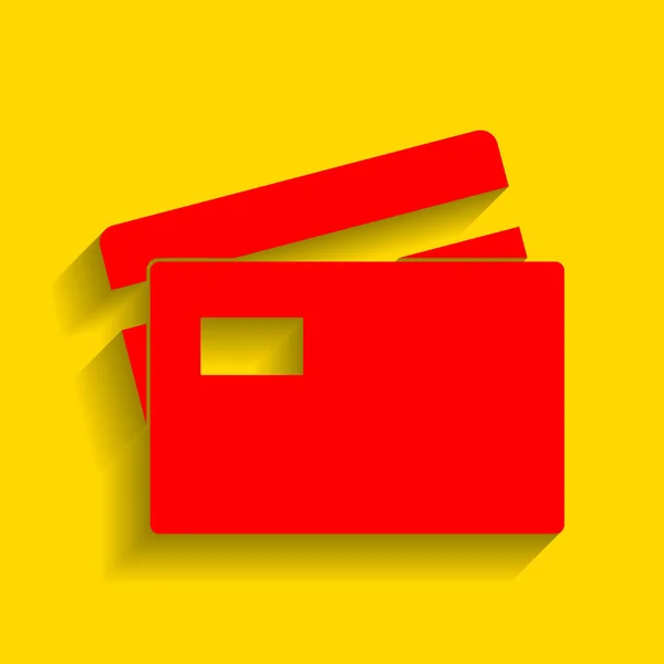 Signo de tarjeta de crédito. Vector. Icono rojo con sombra suave sobre fondo dorado . — Vector de stock