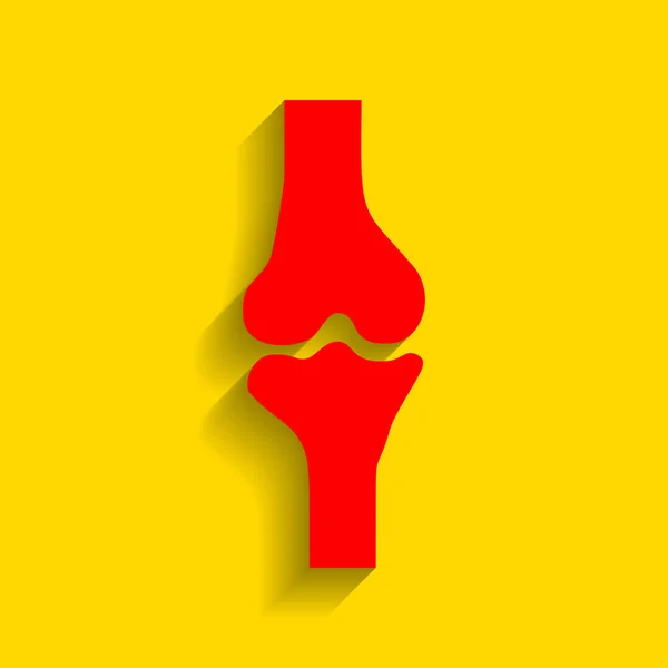 Señal de articulación de rodilla. Vector. Icono rojo con sombra suave sobre fondo dorado . — Vector de stock