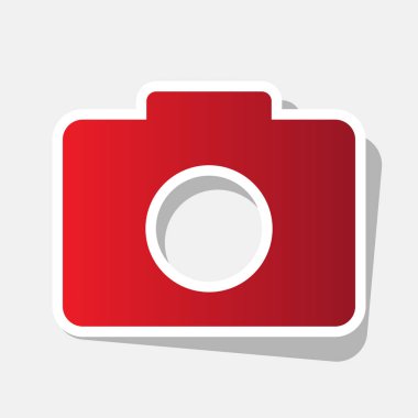 Dijital kamera işareti. Vektör. Açık gri renkli dış kontur ve gri gölge ile yeni yıl kırmızımsı simgesi.