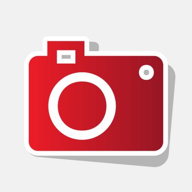 Dijital kamera işareti. Vektör. Açık gri renkli dış kontur ve gri gölge ile yeni yıl kırmızımsı simgesi.