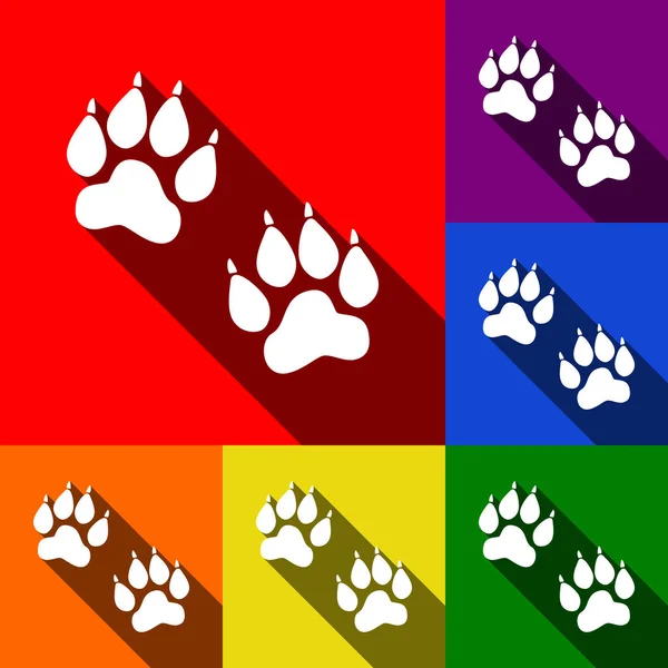 Zvířecí stopy znamení. Vektor. Sada ikon s ploché stíny v červené, oranžové, žluté, zelené, modré a fialové pozadí. — Stockový vektor