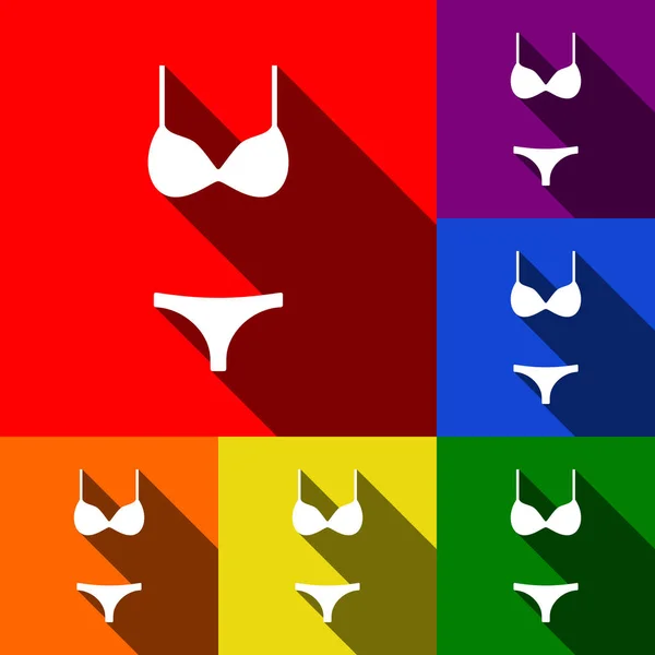 Women wimsuit sign. Vector. Set of icons with flat shadows at red, orange, yellow, green, blue and violet background. — Stock Vector