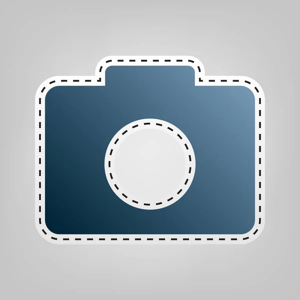 Digital camera sign. Vector. Blue icon with outline for cutting out at gray background.