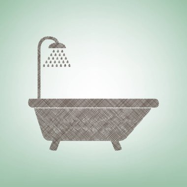 Küvet işareti. Vektör. Işık spot Merkezi yeşil zemin üzerine kahverengi keten simgesi.