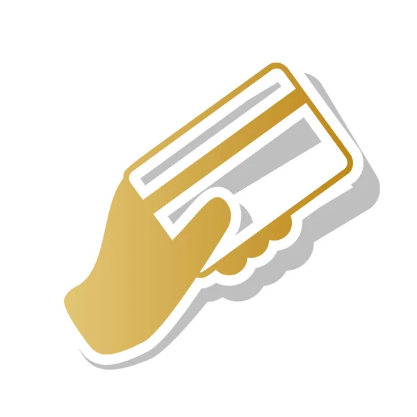 Hand hält eine Kreditkarte. Vektor. goldenes Gradienten-Symbol mit wh — Stockvektor