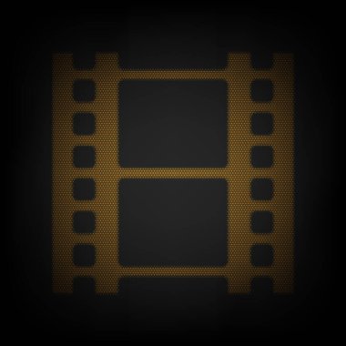 Film makarası tabelası. Karanlıktaki küçük turuncu ampulün ızgarası gibi simge.