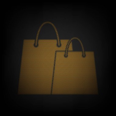 Alışveriş torbaları tabelası. Karanlıktaki küçük turuncu ampulün ızgarası gibi simge.