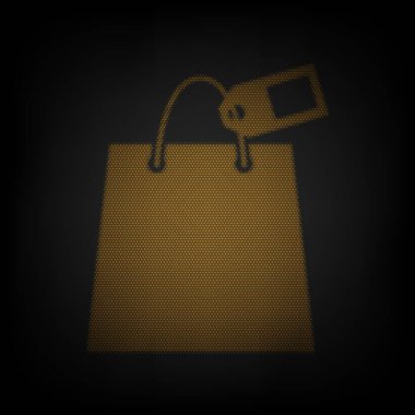 Etiketli alışveriş çantası tabelası. Karanlıktaki küçük turuncu ampulün ızgarası gibi simge.