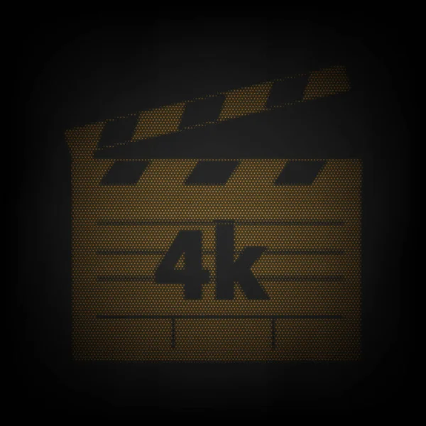 4Kフィルムサインだ 暗闇の中の小さなオレンジ色の電球のグリッドとしてのアイコン — ストックベクタ