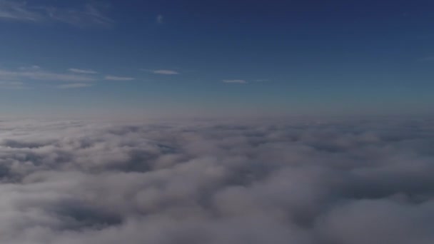 Beautiful cloudscape with large, building clouds and sunrise breaking through cloud mass. — Stock Video