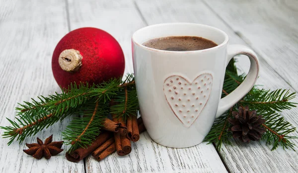 Cup of coffee and christmas decoration — Stock Photo, Image