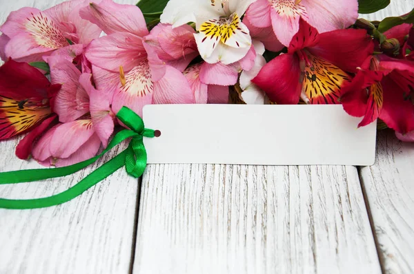 Paper card with alstroemeria flowers — Stock Photo, Image