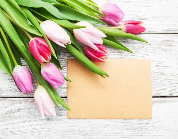 Spring tulips flowers and greeting card — Stock Photo, Image