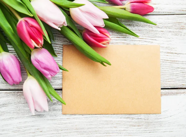 Spring tulips flowers and greeting card — Stock Photo, Image